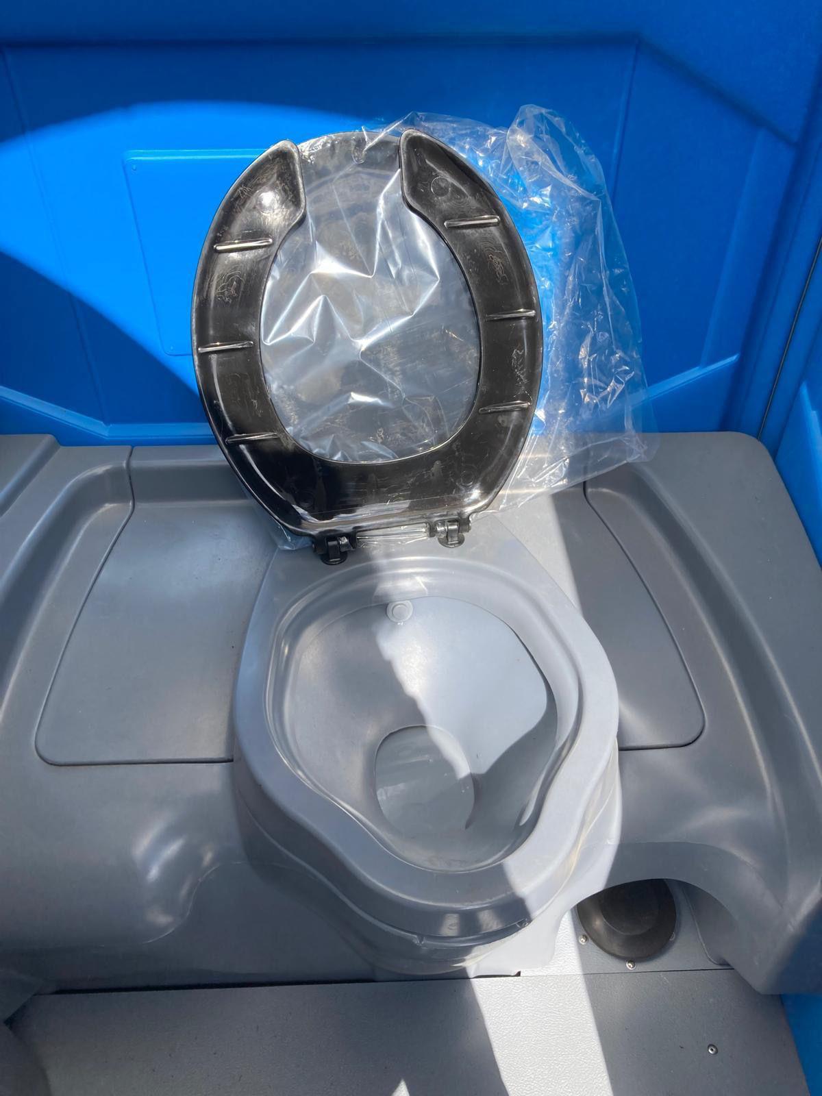 Freshly sanitized portable toilet seat with hygiene liner – Chicago